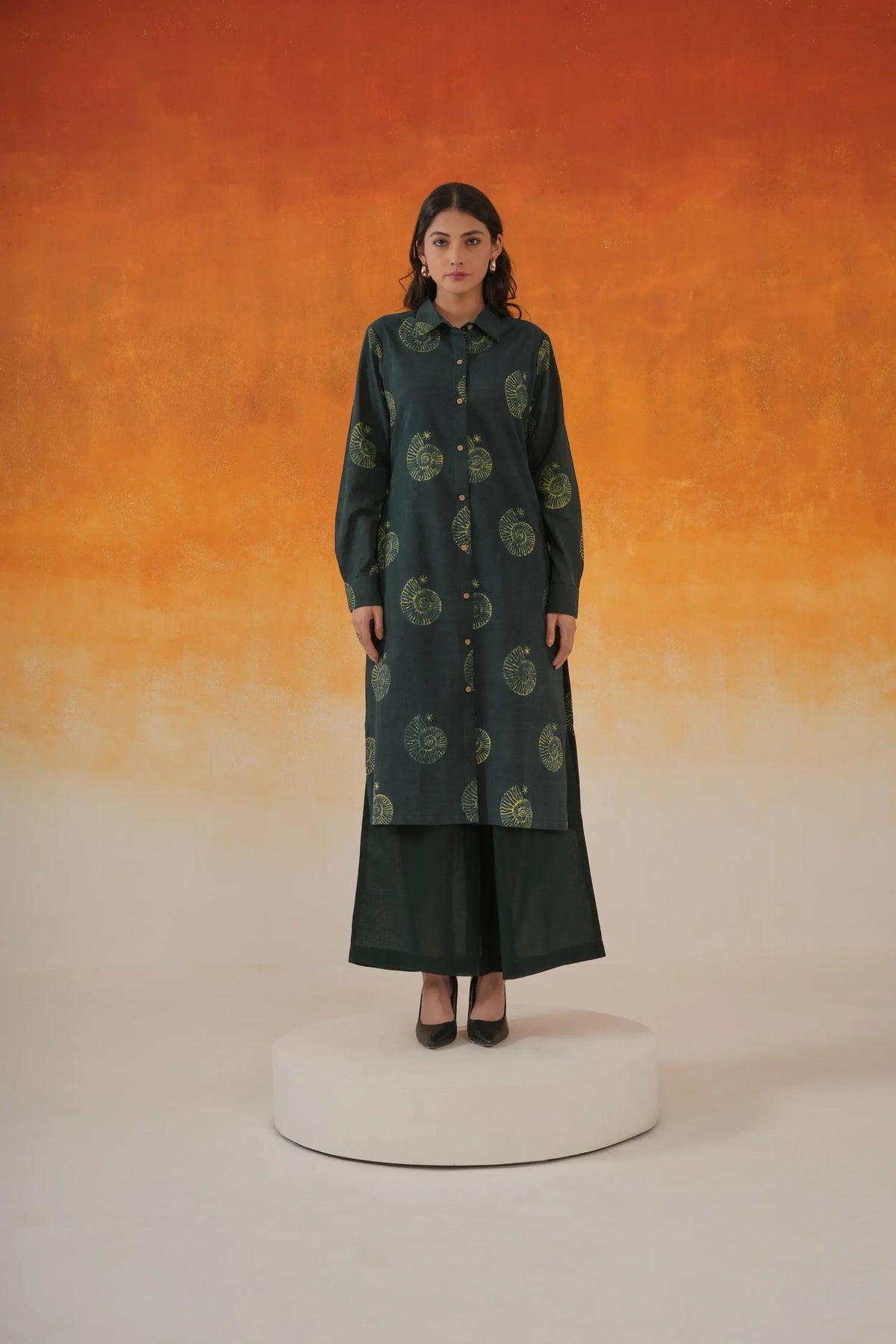 Conch shirt-style Ajrakh cotton kurta in bottle green - World of Toji