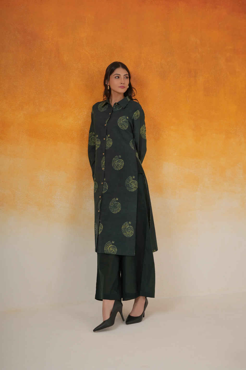 Conch shirt-style Ajrakh cotton kurta in bottle green