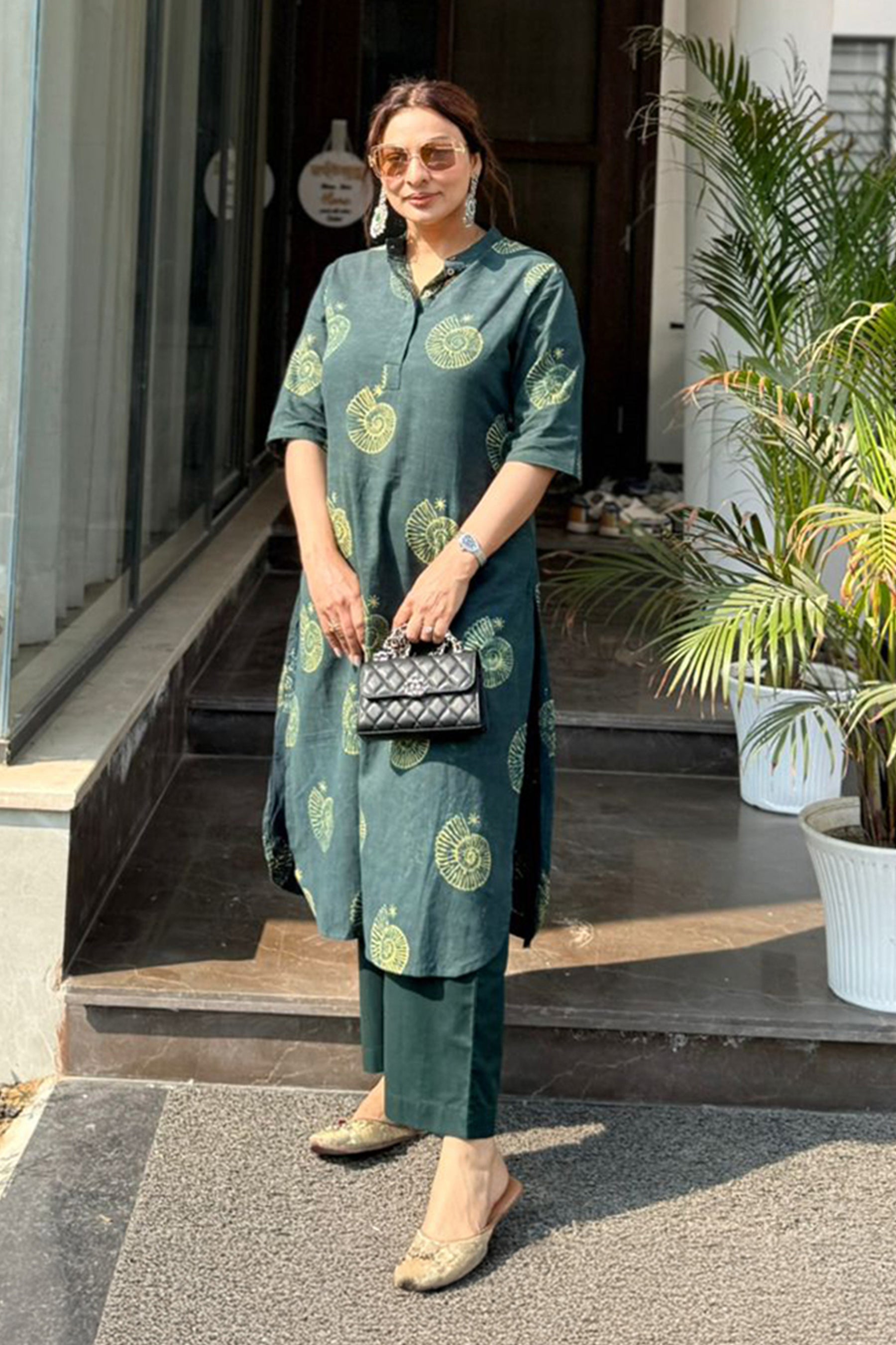Conch A-line Ajrakh cotton kurta in bottle green - World of Toji