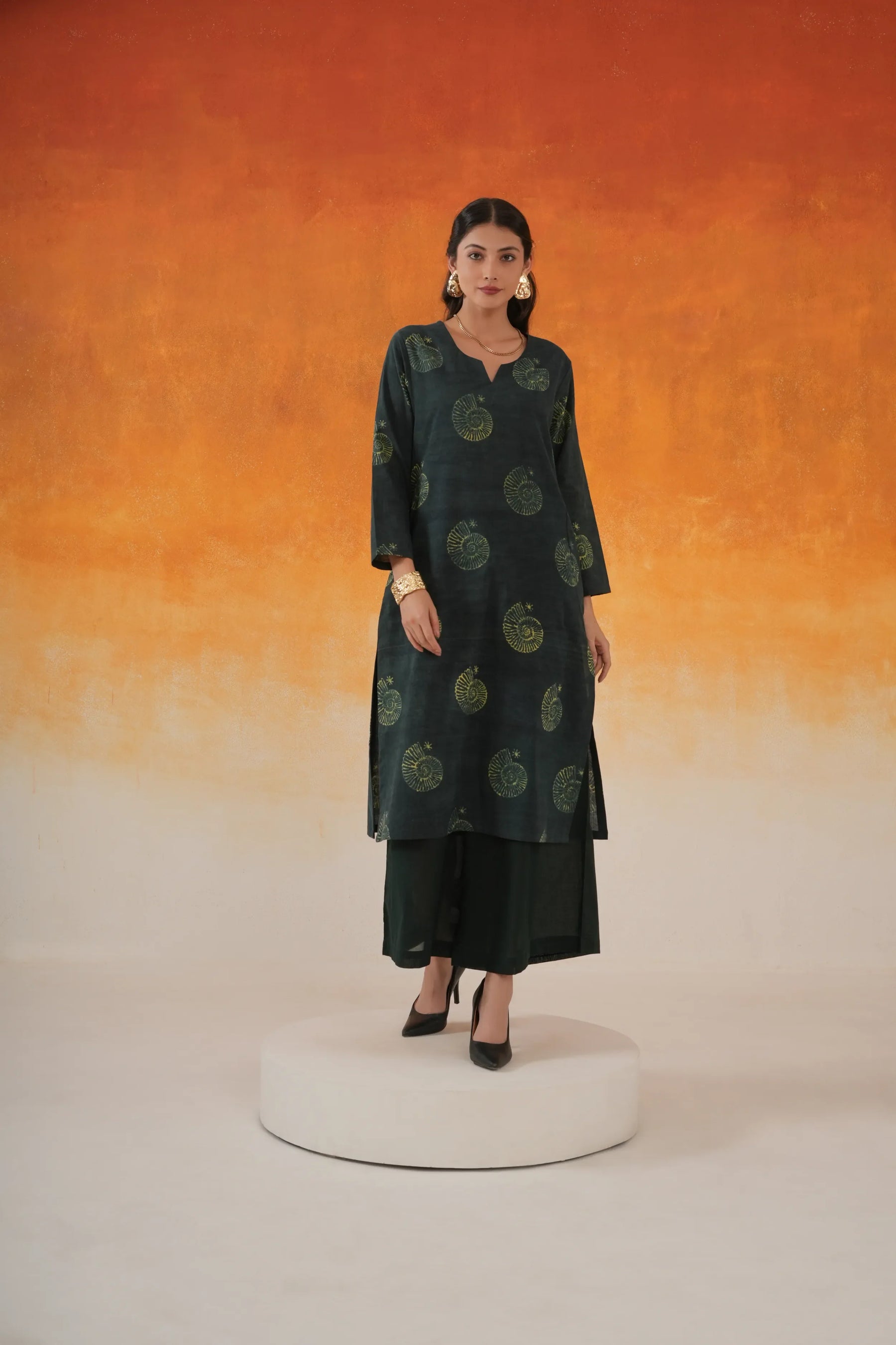 Conch straight Ajrakh cotton kurta set in bottle green - World of Toji