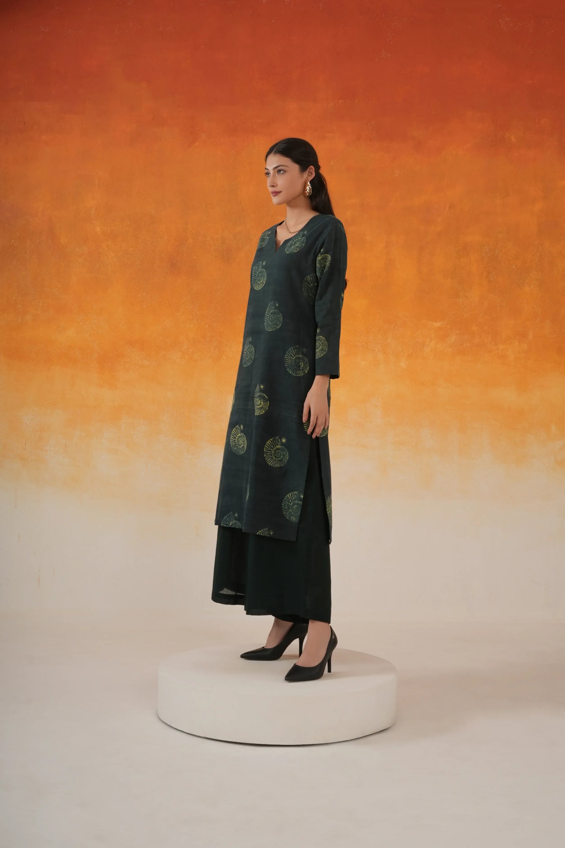 Conch straight Ajrakh cotton kurta set in bottle green - World of Toji