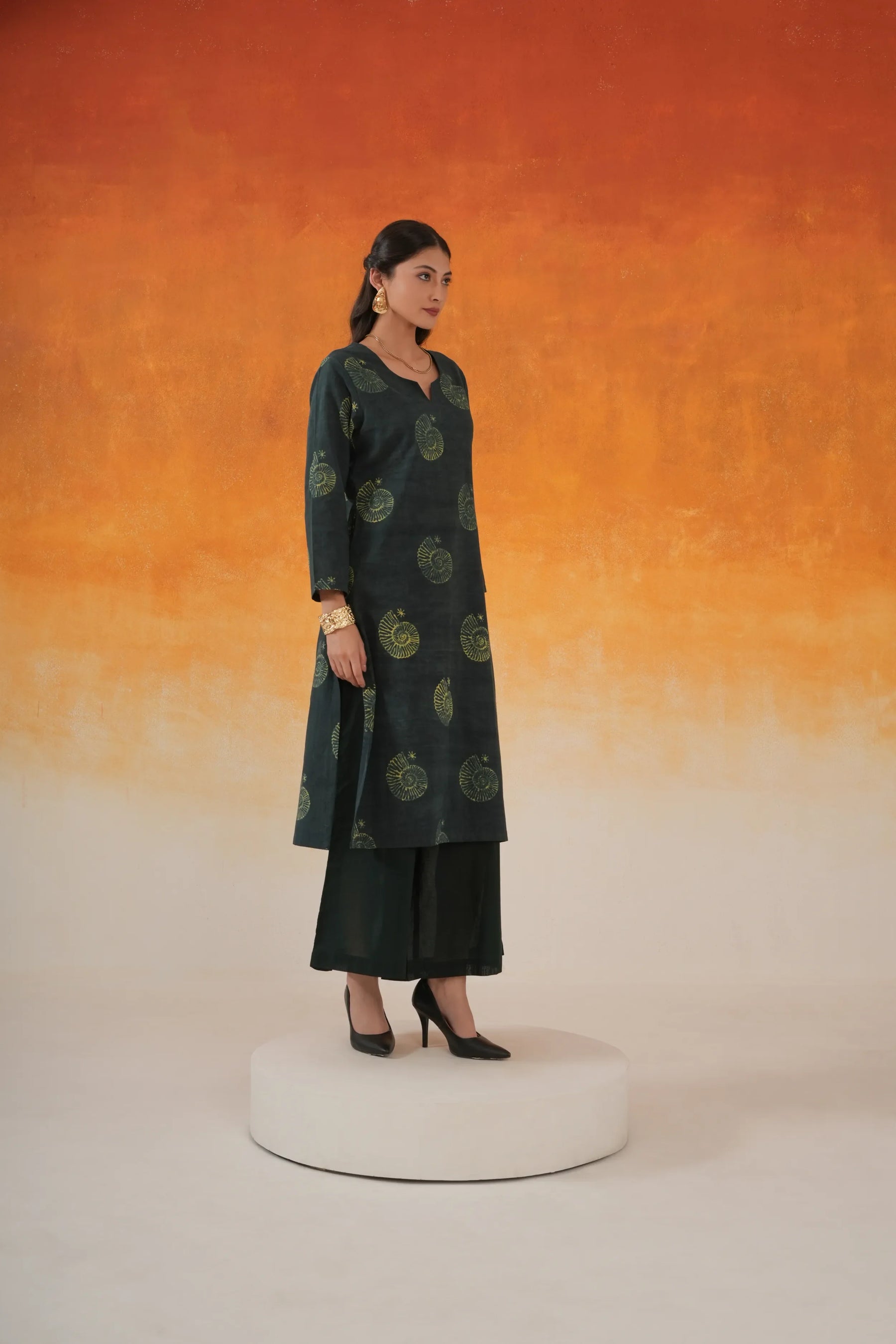 Conch straight Ajrakh cotton kurta set in bottle green - World of Toji