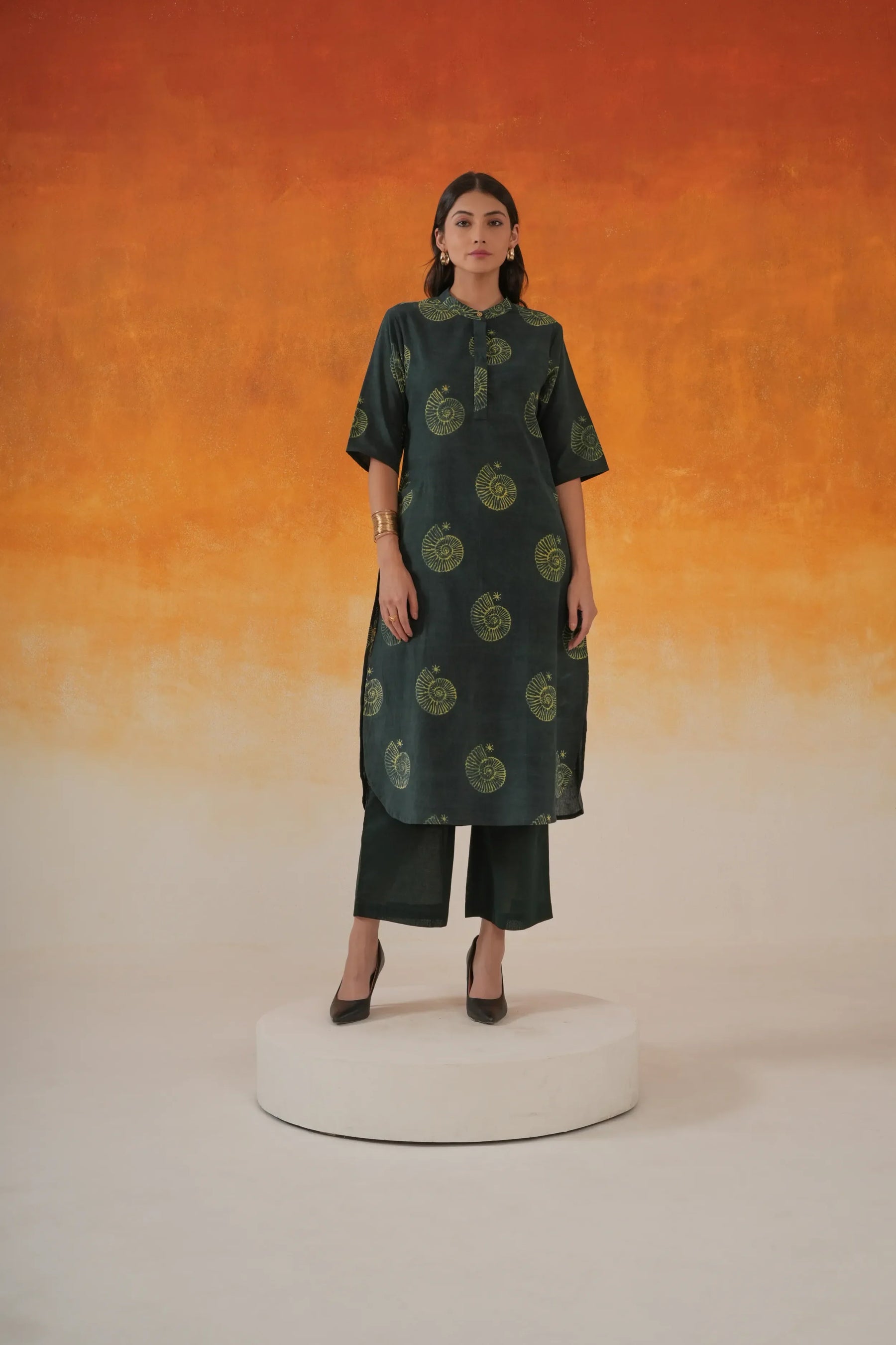 Conch A-line Ajrakh cotton kurta in bottle green - World of Toji