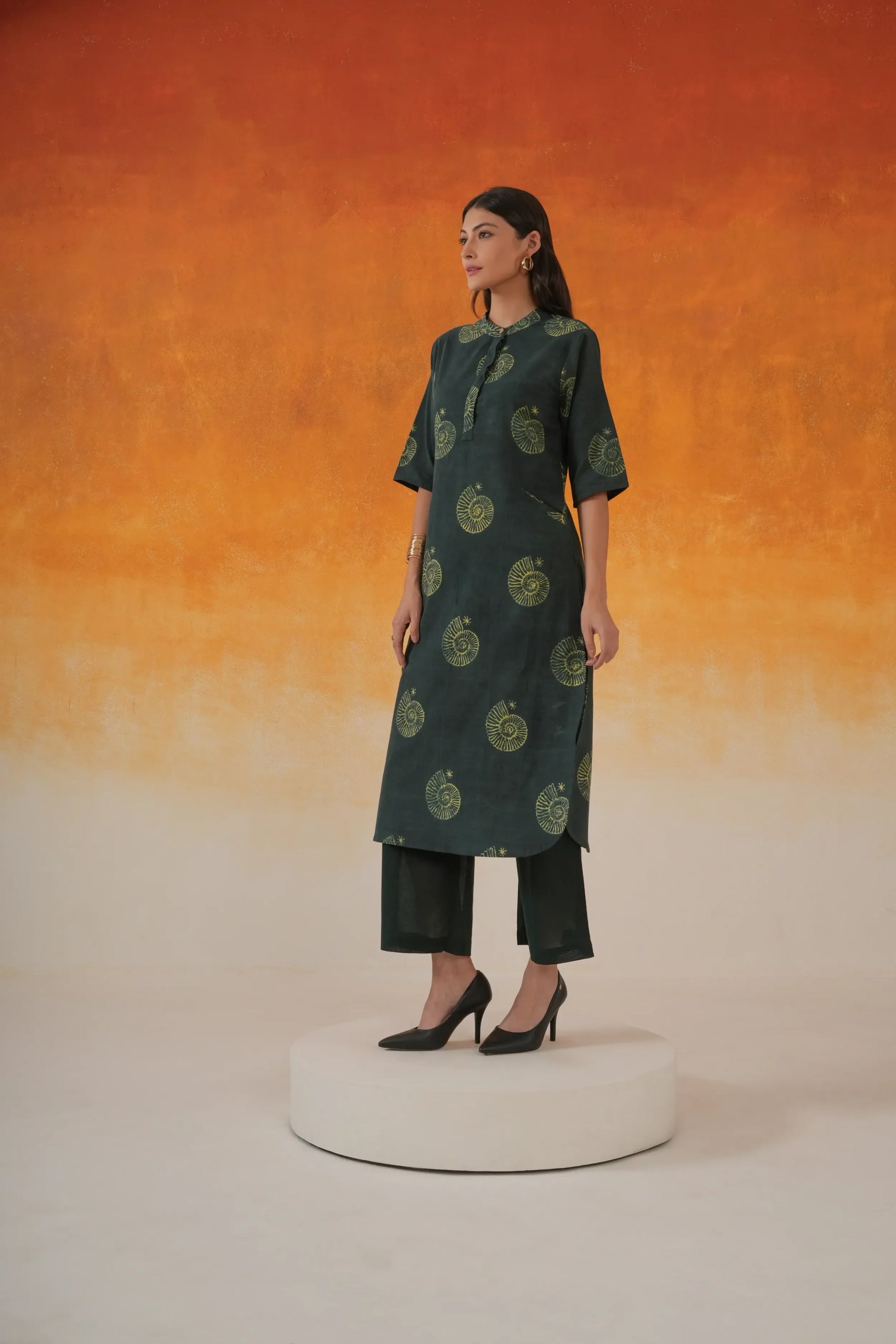 Conch A-line Ajrakh cotton kurta in bottle green - World of Toji