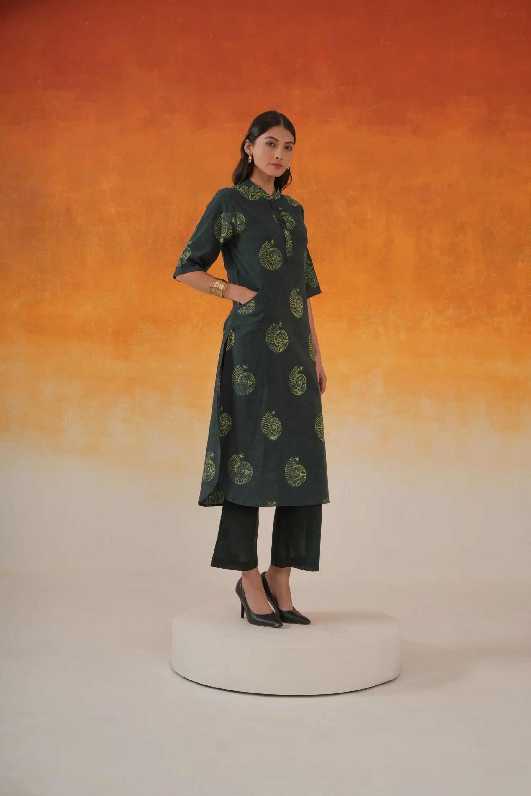 Conch A-line Ajrakh cotton kurta in bottle green - World of Toji