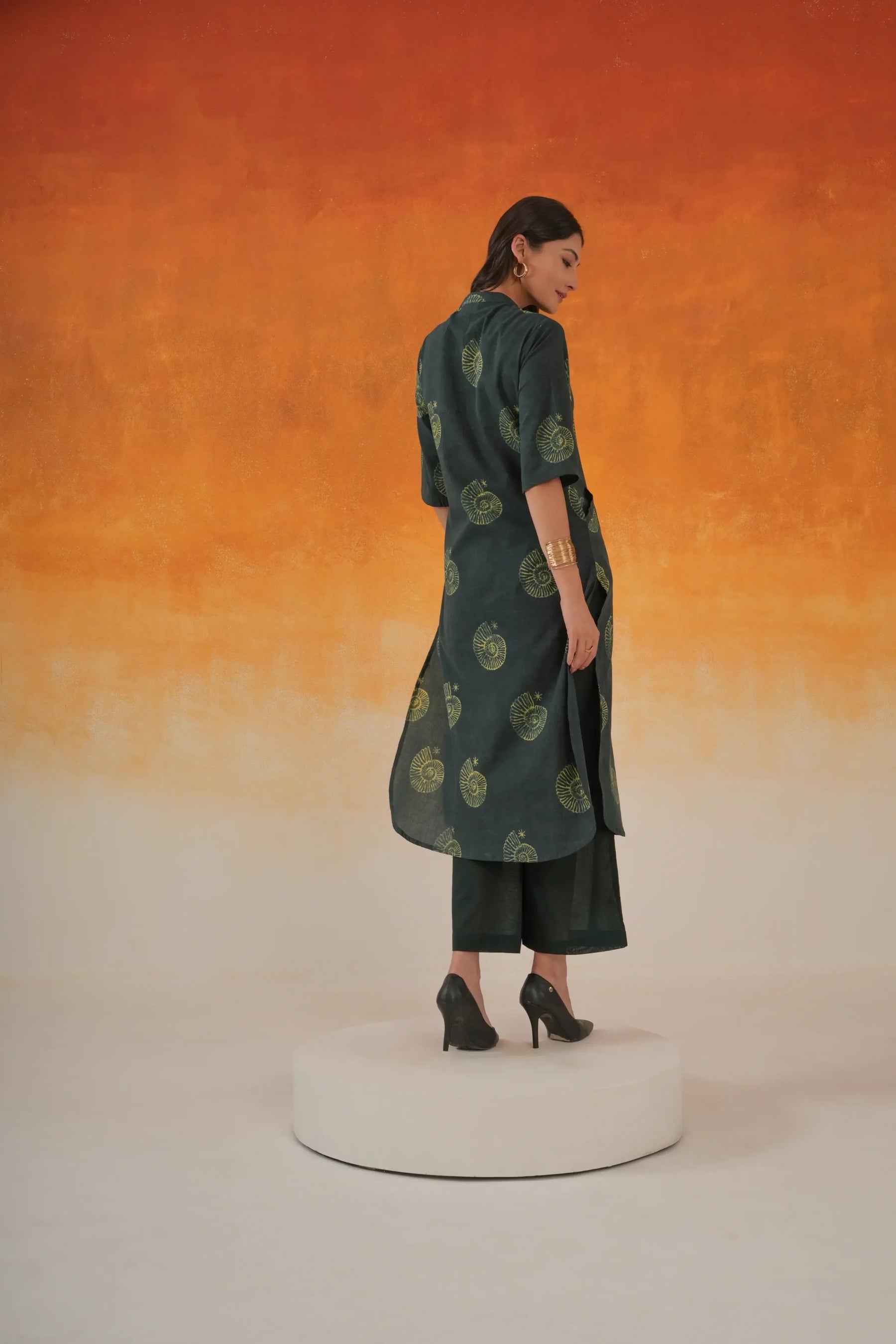 Conch A-line Ajrakh cotton kurta in bottle green - World of Toji